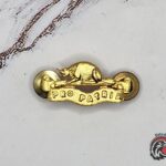 #1141 - WW2 Royal Canadian Regiment (RCR) Collar Badge – "Pro Patria"