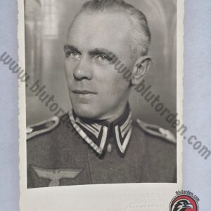 #2295 - Signed WWII Heer NCO Studio Portrait — Embossed “Foto-Regal, Jassy” RPPC