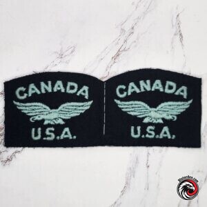 #1297 - WWII Canada–U.S.A. Allied Air Training Shoulder Titles Pair